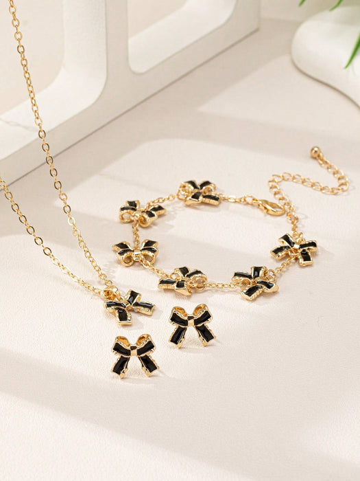 SHEIN 1 collar de aleación con revestimiento 3D y lazo negro, 1 pulsera Y 1 par de pendientes - Quierox - Tienda Online
