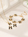 SHEIN 1 collar de aleación con revestimiento 3D y lazo negro, 1 pulsera Y 1 par de pendientes - Quierox - Tienda Online