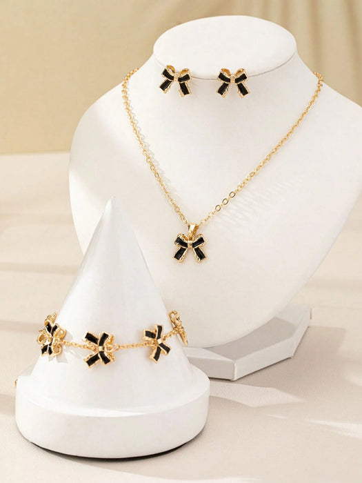 SHEIN 1 collar de aleación con revestimiento 3D y lazo negro, 1 pulsera Y 1 par de pendientes - Quierox - Tienda Online