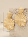 SHEIN 1 par de pendientes de botón con diseño de concha de caracol - Quierox - Tienda Online