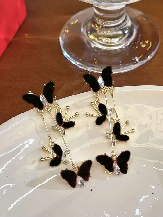 Shein 1 par de pendientes elegantes de borlas largas con mariposa negra, versátiles para el uso diario - Quierox - Tienda Online