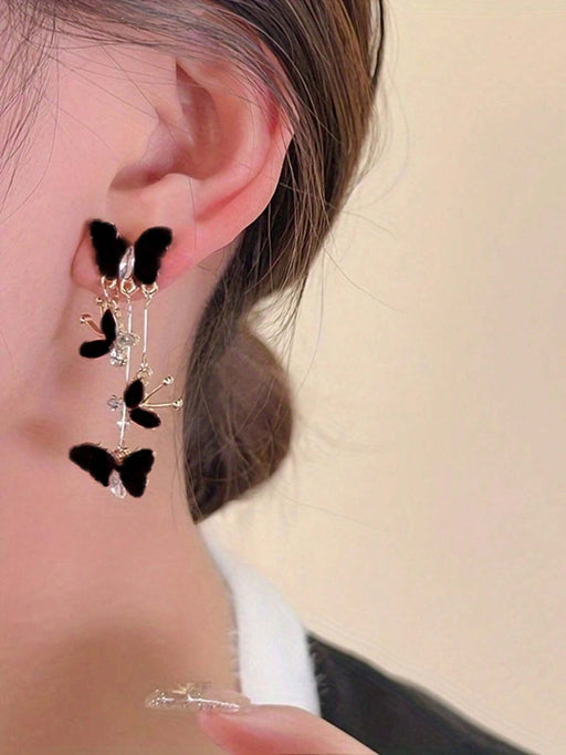 Shein 1 par de pendientes elegantes de borlas largas con mariposa negra, versátiles para el uso diario - Quierox - Tienda Online