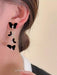 Shein 1 par de pendientes elegantes de borlas largas con mariposa negra, versátiles para el uso diario - Quierox - Tienda Online
