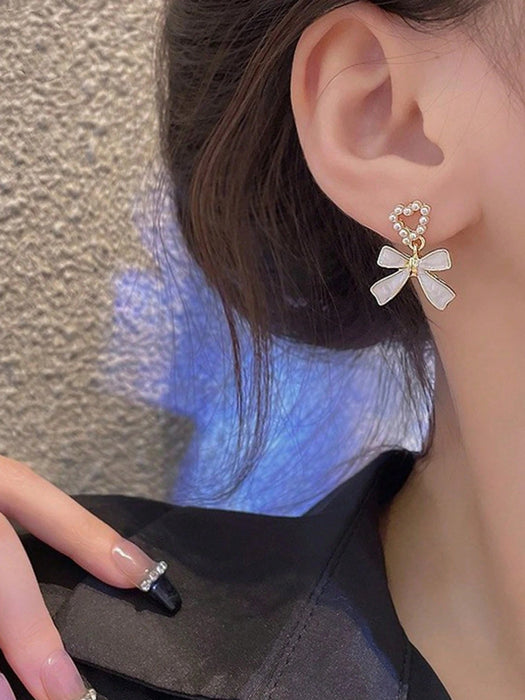 Shein 1 par de pendientes tipo perla de imitación con moño - Quierox - Tienda Online