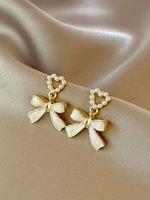 Shein 1 par de pendientes tipo perla de imitación con moño - Quierox - Tienda Online