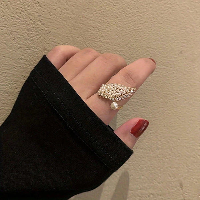 Shein 1 pieza de exquisito anillo de ala de perla con circonita cúbica incrustada en cobre - Quierox - Tienda Online