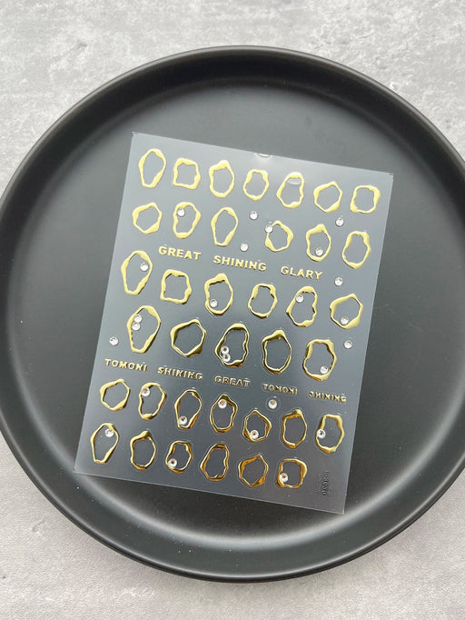 Shein 1 pieza de pegatinas para decoración de uñas con marco dorado asimétrico metálico - Quierox - Tienda Online