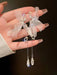 Shein 1 pieza de pendientes colgantes con decoración de lazo y perlas sintéticas - Quierox - Tienda Online