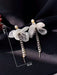 Shein 1 pieza de pendientes colgantes con decoración de lazo y perlas sintéticas - Quierox - Tienda Online