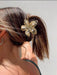 SHEIN 1 pieza Pinza para el cabello con forma de flor dorada - Quierox - Tienda Online