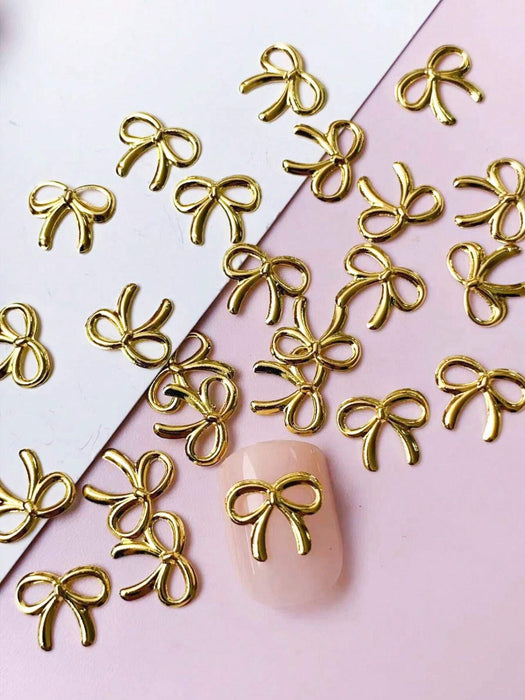 Shein 100 piezas de decoración de uñas de lazo metálico 3D, lindo, fresco, retro - Quierox - Tienda Online