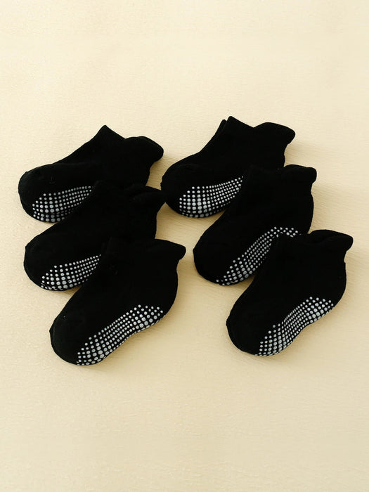 Shein 12 pares de calcetines negros antideslizantes gruesos para niños - Quierox - Tienda Online