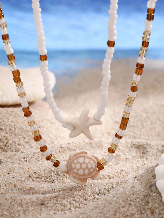 SHEIN 2 piezas de collar gargantilla con colgante de estrella de mar y tortuga marina - Quierox - Tienda Online