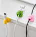 SHEIN 5 organizadores de cables pequeños y coloridos, sin necesidad de perforar. - Quierox - Tienda Online