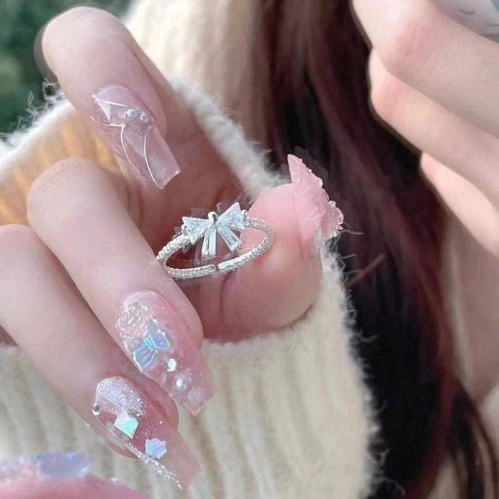 SHEIN Anillo ajustable con lazo abierto de plata "Time Princess" de JINLU - Quierox - Tienda Online