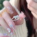 SHEIN Anillo ajustable con lazo abierto de plata "Time Princess" de JINLU - Quierox - Tienda Online