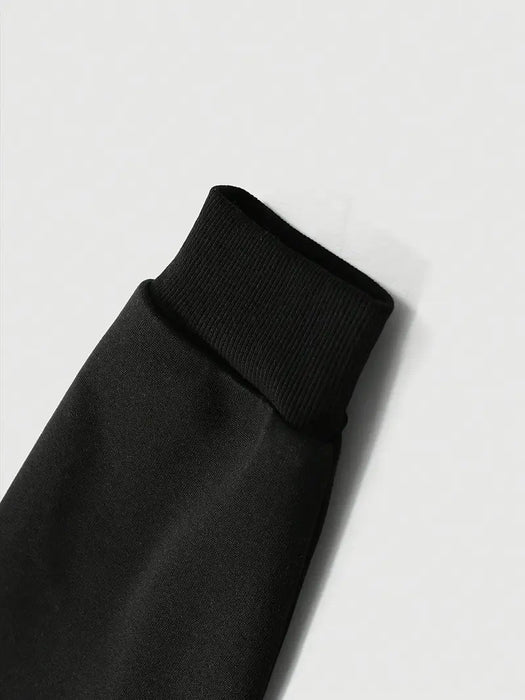 Shein Atuendo casual para hombre con un gráfico de diente de oro, compuesto por un hoodie negro combinado con pantalones acampanados - Quierox - Tienda Online