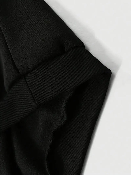 Shein Atuendo casual para hombre con un gráfico de diente de oro, compuesto por un hoodie negro combinado con pantalones acampanados - Quierox - Tienda Online