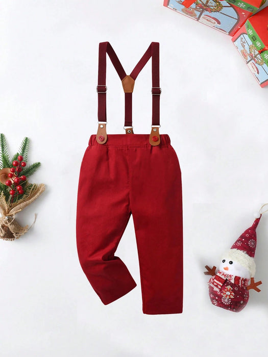 SHEIN BOARNSEORL Camisa de manga larga con estampado de renos navideños con corbata de moño y pantalones con tirantes para niños - Quierox - Tienda Online