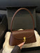 SHEIN Bolso baguette con de cerradura de metal, de hombro para mujer - Quierox - Tienda Online