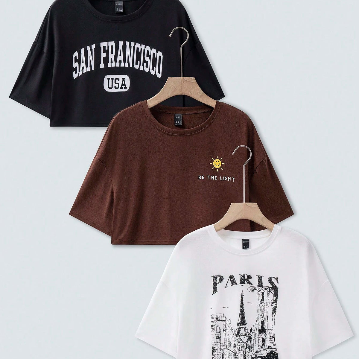 Shein Camiseta con hombros caidos y estampado
