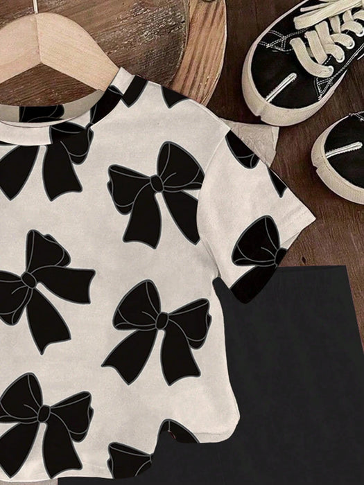 SHEIN camiseta de manga corta con cuello redondo y estampado de lazo y leggings de punto - Quierox - Tienda Online