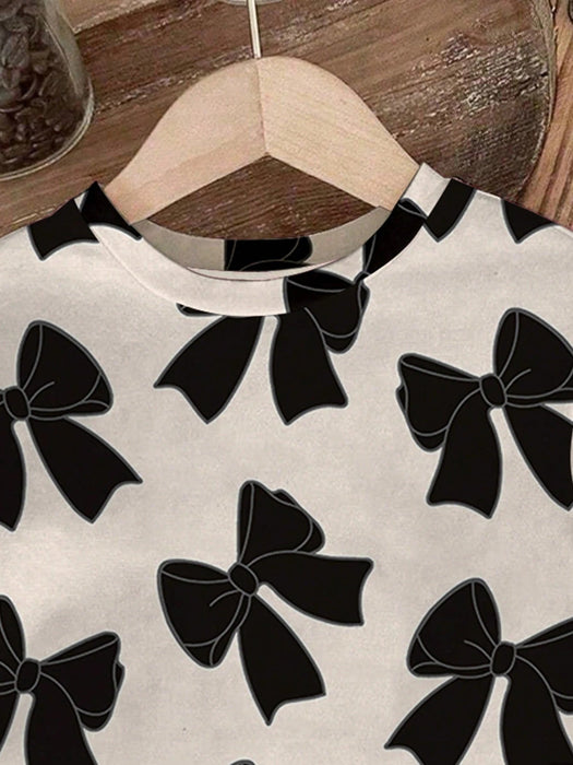 SHEIN camiseta de manga corta con cuello redondo y estampado de lazo y leggings de punto - Quierox - Tienda Online