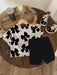 SHEIN camiseta de manga corta con cuello redondo y estampado de lazo y leggings de punto - Quierox - Tienda Online