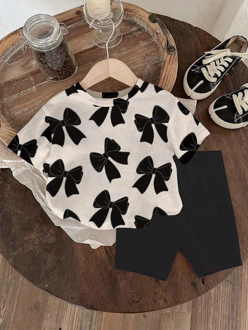 SHEIN camiseta de manga corta con cuello redondo y estampado de lazo y leggings de punto - Quierox - Tienda Online