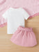 SHEIN Camiseta Gráfica De Figura De Bebé Niña Y Falda De Cintura De Papel Con Cinturón - Quierox - Tienda Online