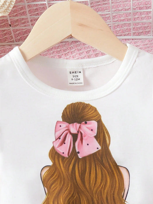 SHEIN Camiseta Gráfica De Figura De Bebé Niña Y Falda De Cintura De Papel Con Cinturón - Quierox - Tienda Online