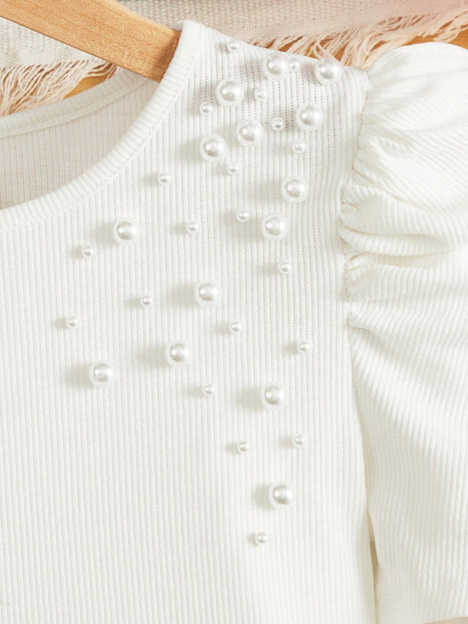 SHEIN Chica preadolescente Camiseta con cuenta de perla detalle de manga farol - Quierox - Tienda Online