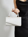 SHEIN Clutch de moda para mujer, de color liso, con decoración metálica y cierre de solapa - Quierox - Tienda Online