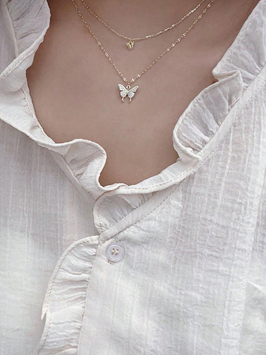SHEIN Collar a capas con diamante de imitación con accesorio de mariposa - Quierox - Tienda Online