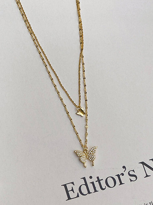 SHEIN Collar a capas con diamante de imitación con accesorio de mariposa - Quierox - Tienda Online