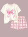 SHEIN Conjunto de 2 piezas para niñas, camiseta de manga corta y shorts con estampado - Quierox - Tienda Online