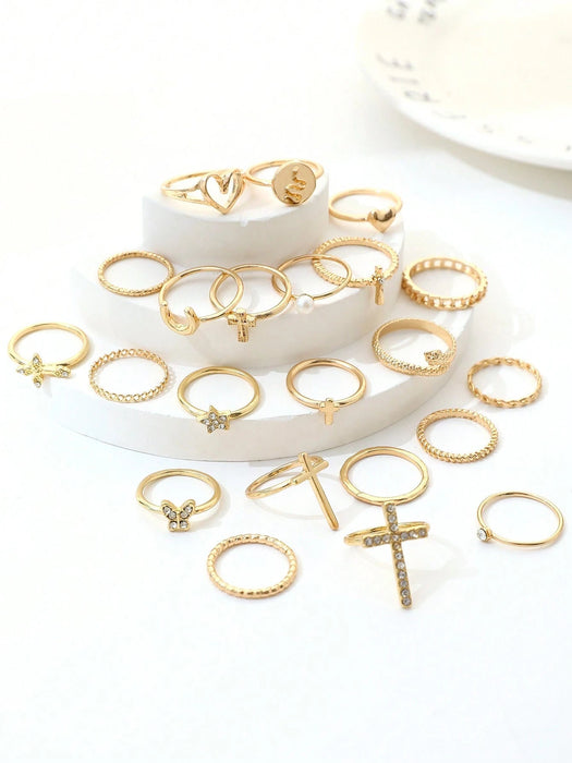 Shein Conjunto de 22 anillos de moda con incrustaciones de diamantes de imitación, estilo Y2K Punk, con cruz, mariposa y corazón - Quierox - Tienda Online