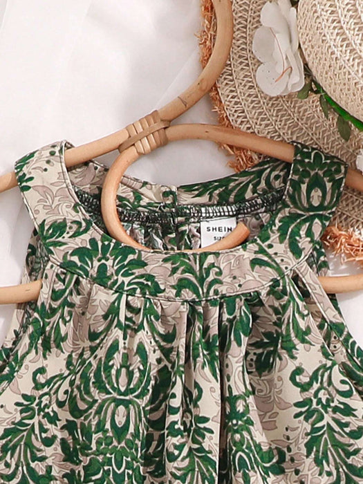 SHEIN Conjunto de camiseta sin mangas y shorts estampados para niñas - Quierox - Tienda Online