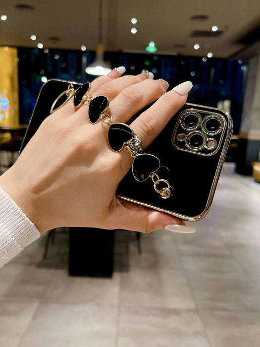 SHEIN Cover de TPU galvanizada negra con diseño de corazón para Apple - Quierox - Tienda Online