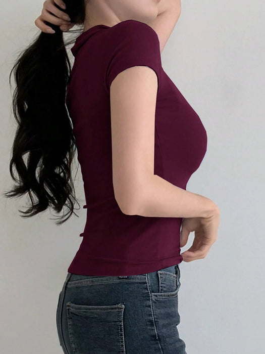 SHEIN DAZY Camiseta de manga corta con cuello en V y solapa de color liso para mujer - Quierox - Tienda Online