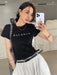 SHEIN DAZY Camiseta de manga corta estampada con letras para mujer - Quierox - Tienda Online