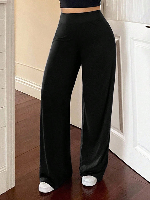 Shein Dazy Plus Pantalones casuales de punto de color liso con cintura elástica y pernera acampanada - Quierox - Tienda Online