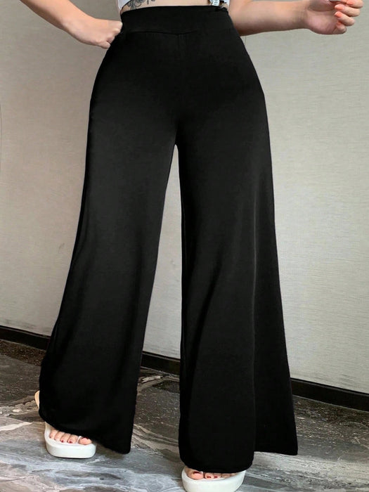 Shein Dazy Plus Pantalones casuales de punto de color liso con cintura elástica y pernera acampanada - Quierox - Tienda Online