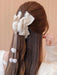 Shein Elegante pinza para el cabello con lazo y borla - Quierox - Tienda Online