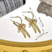 Shein Elegantes pendientes de borla con lazo dorado para mujer, diseño ligero y elegante - Quierox - Tienda Online