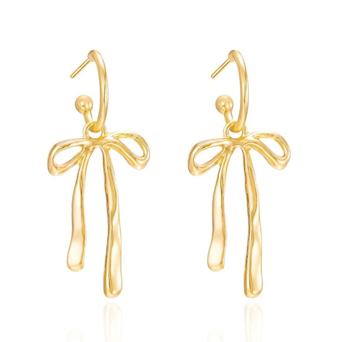 Shein Elegantes pendientes de borla con lazo dorado para mujer, diseño ligero y elegante - Quierox - Tienda Online
