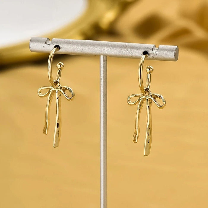 Shein Elegantes pendientes de borla con lazo dorado para mujer, diseño ligero y elegante - Quierox - Tienda Online
