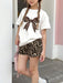 Shein Emery Rose Conjunto para niñas de camiseta de manga corta y pantalones cortos con estampado de leopardo y lazo - Quierox - Tienda Online