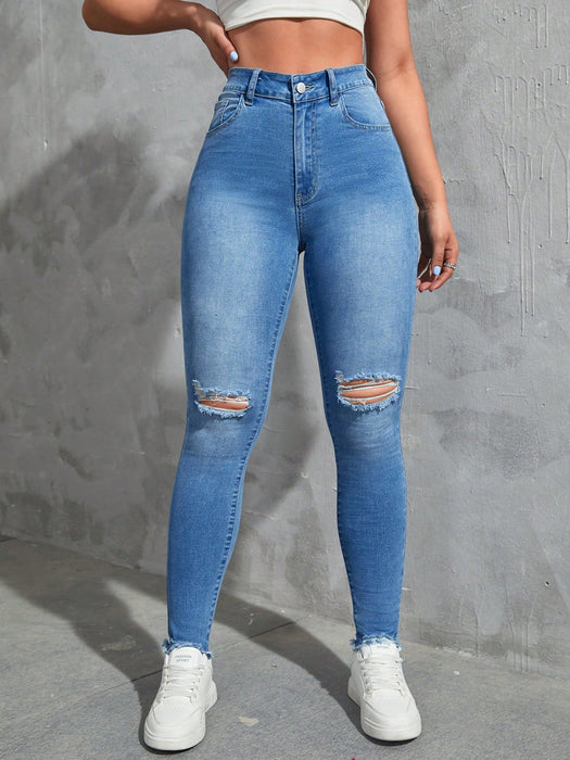SHEIN EZwear Vaqueros ajustados desgastados de moda sólidos para mujer - Quierox - Tienda Online