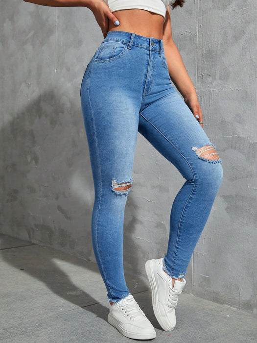 SHEIN EZwear Vaqueros ajustados desgastados de moda sólidos para mujer - Quierox - Tienda Online